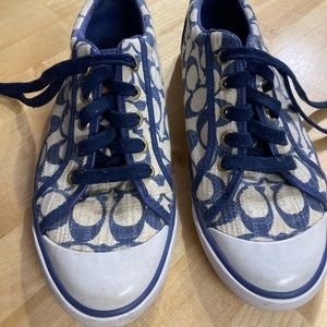 Size 7 gently used coach sneakers in good condition small flaw on back logo